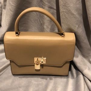 Cute beige handbag with lock